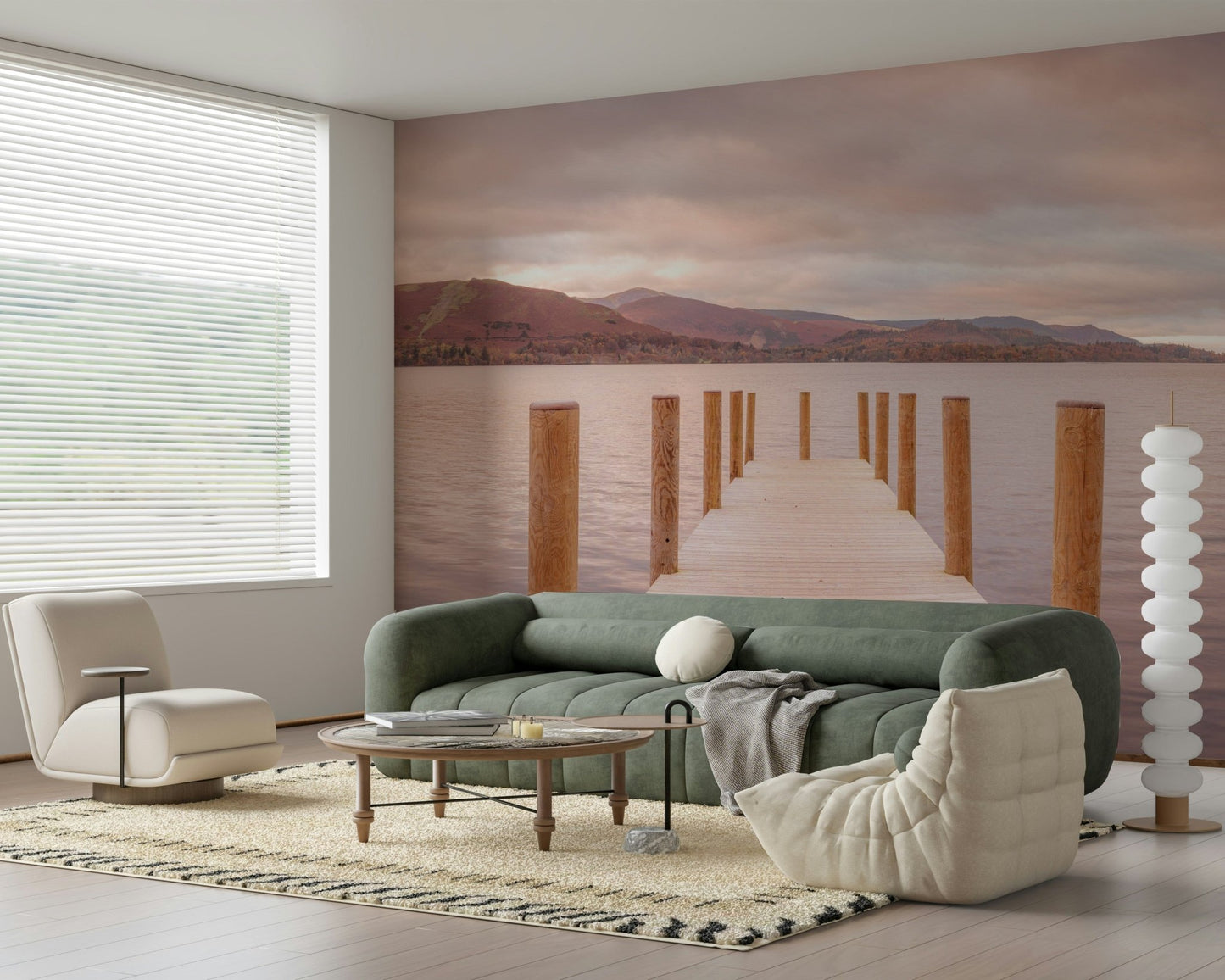 Piering into Nature's Heart wallpaper mural of a sunset lake jetty behind a green tufted sofa and cream Togo chair