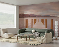 Piering into Nature's Heart wallpaper mural of a sunset lake jetty behind a green tufted sofa and cream Togo chair