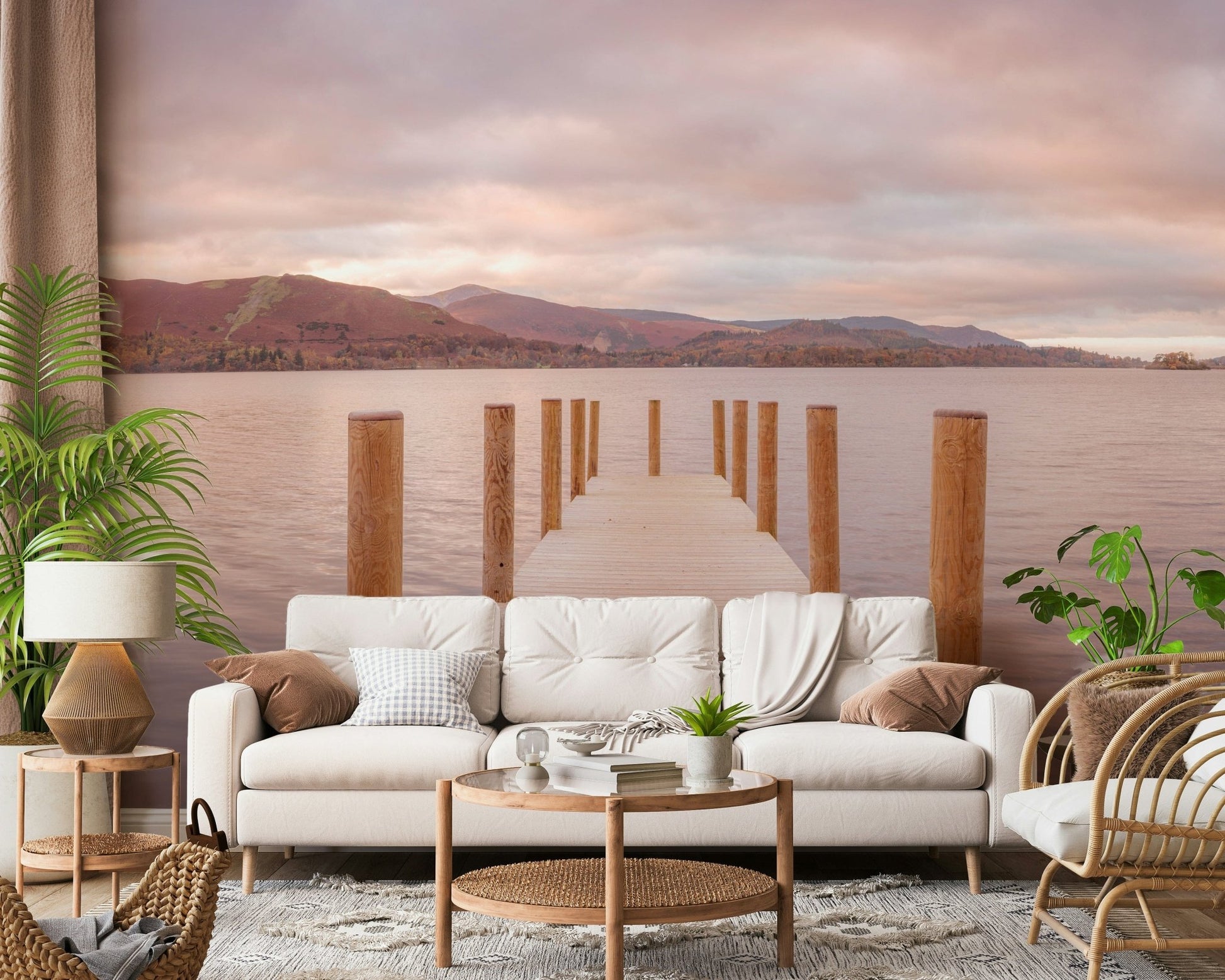 Piering into Nature's Heart wallpaper mural of a serene lake pier behind a cream sofa and palm plant in a living room