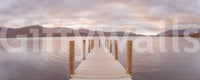 Piering into Nature's Heart wallpaper mural shown as a full-wall view of a wooden jetty on a calm mountain lake at sunset