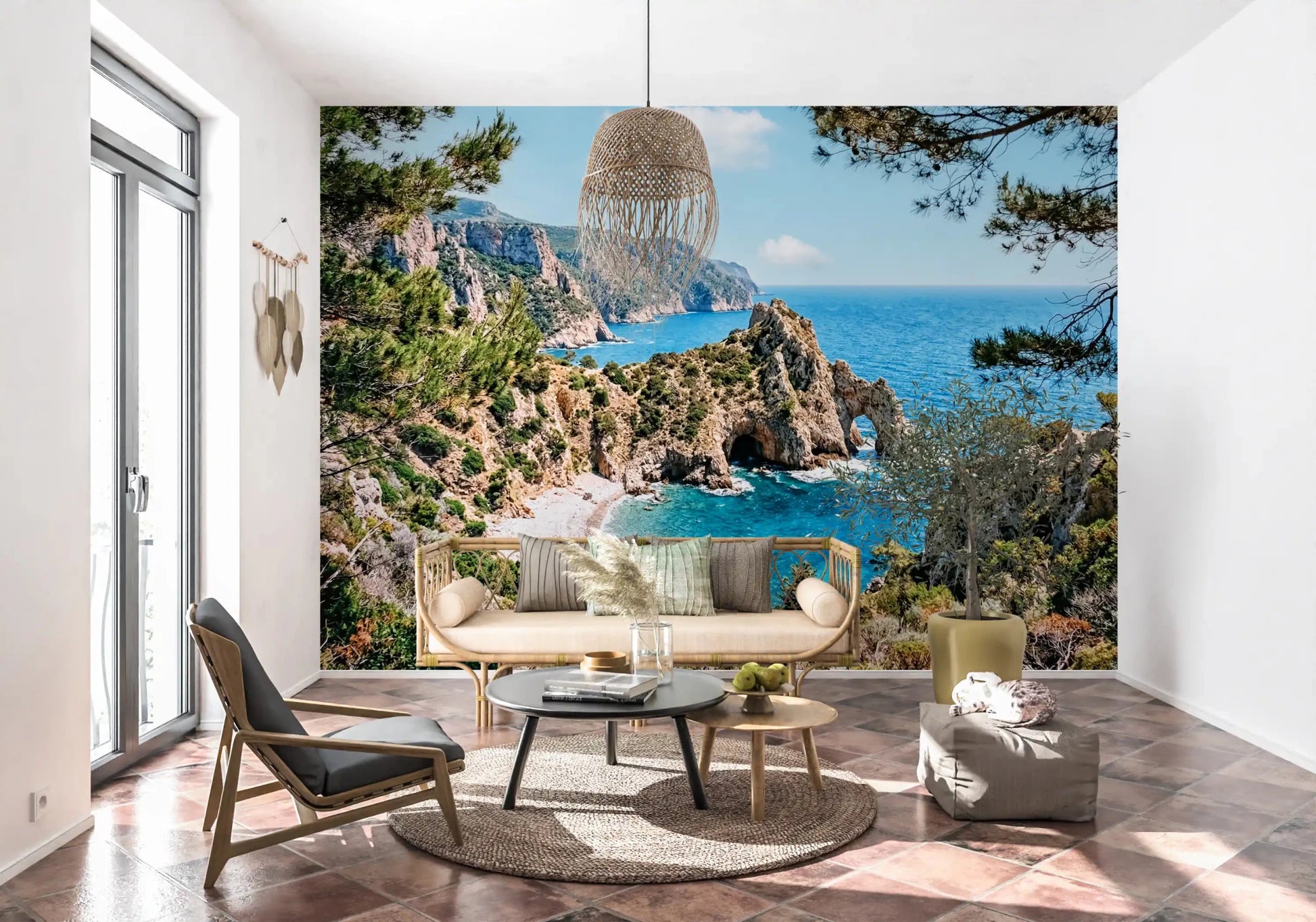 Seaside landscape wall mural framed by pine trees and rugged coastal rock forms