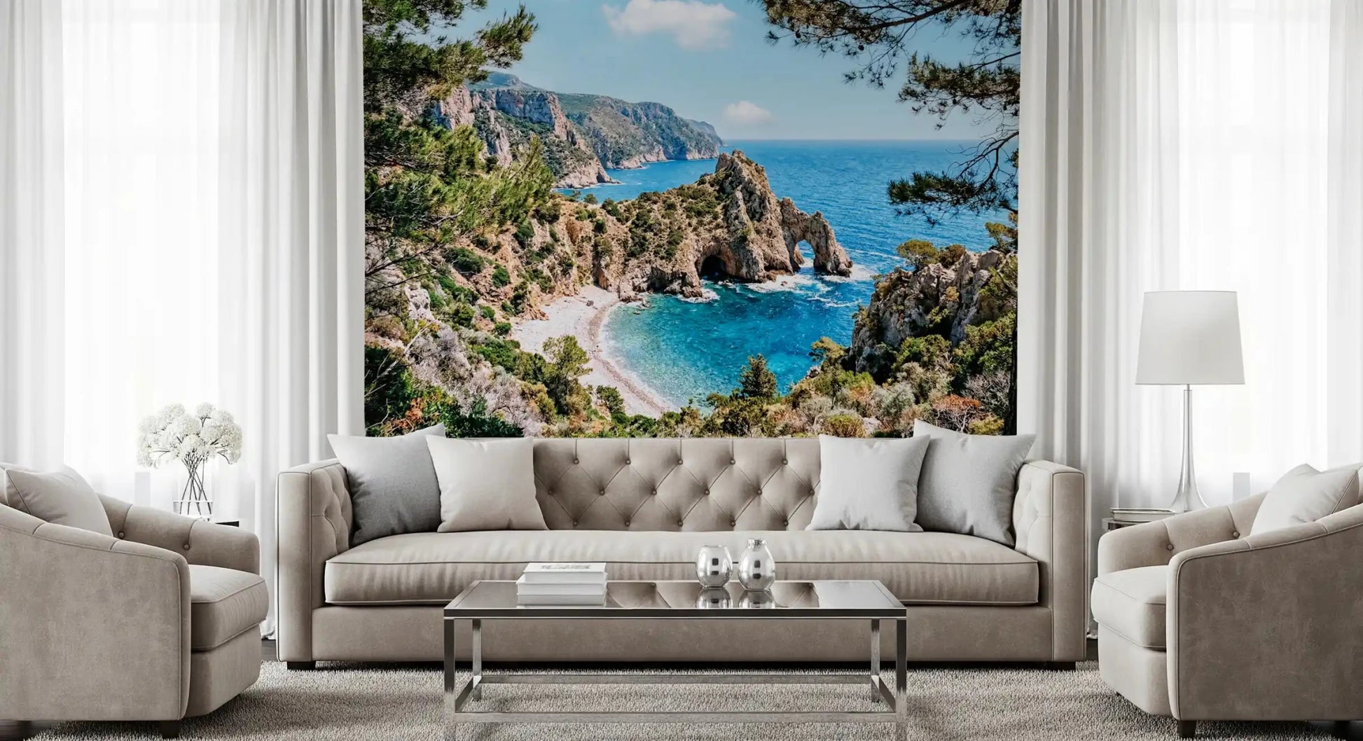 Coastal wall mural in a living room with pine trees, azure sea, and rocky cove