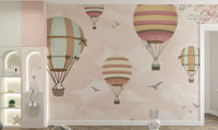 Sky-themed mural with colorful balloons
