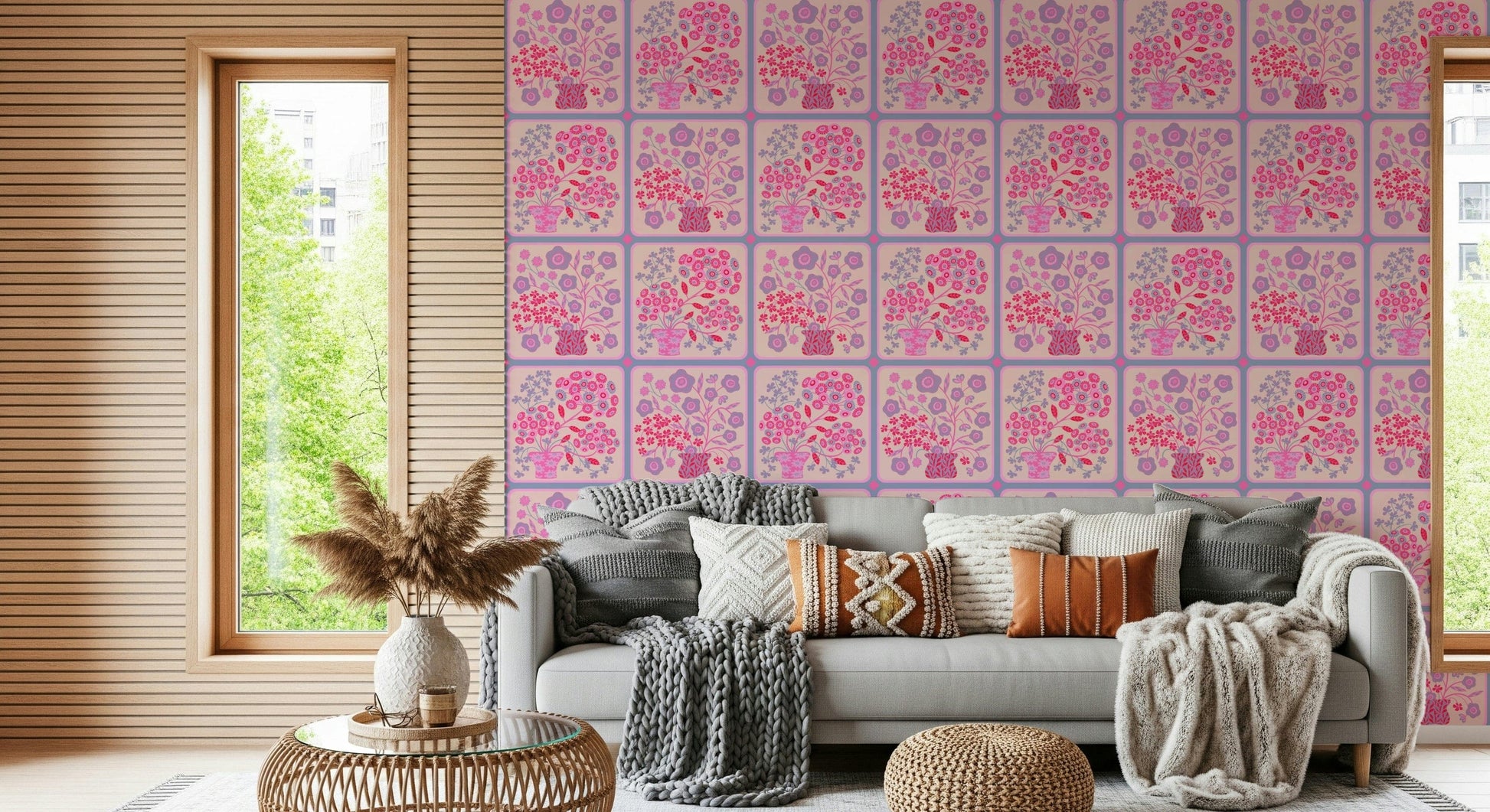 Minimalist furniture paired with a colorful pink and red floral wallpaper backdrop.