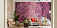 The ground is covered with fallen pink leaves, creating a mystical atmosphere.
