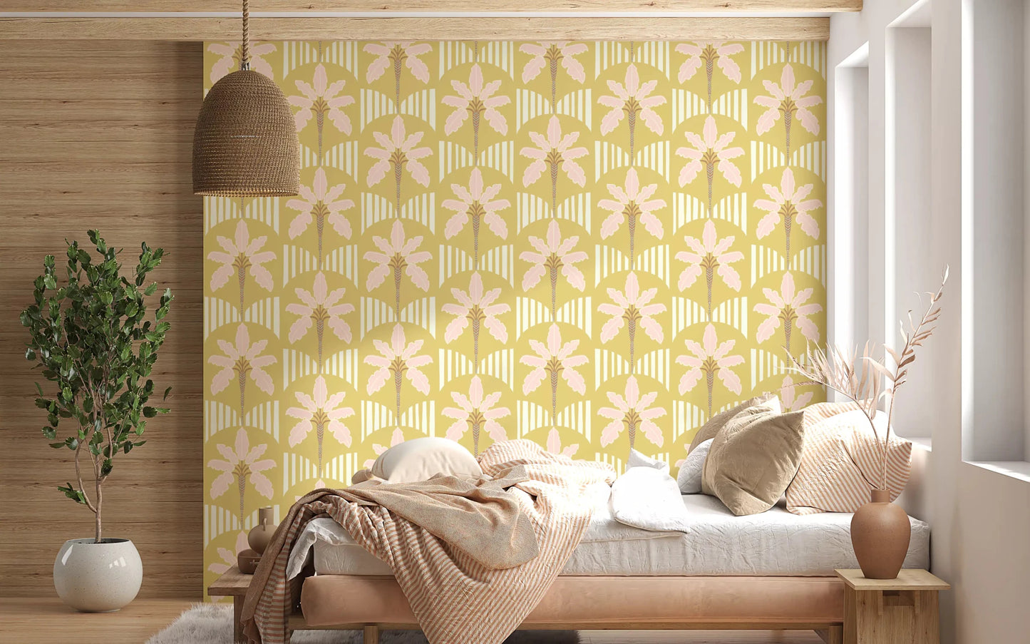 Bedroom with soft pink palm wallpaper and mustard stripe pattern in neutral tones