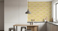 Dining room with pink palm wallpaper and cream stripe arches in warm hues