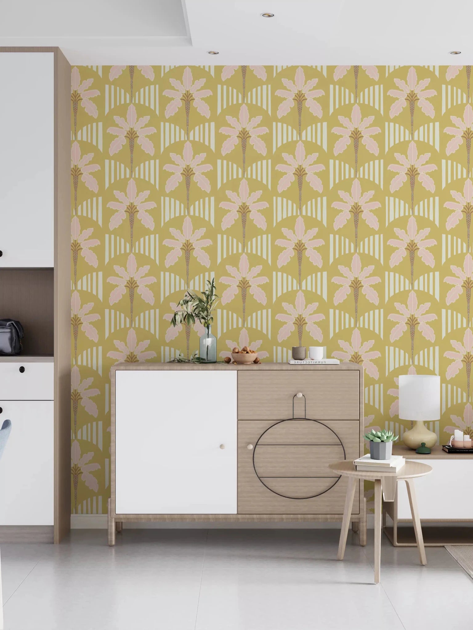 Lounge area with pink palm wallpaper and soft cream stripe detailing in mustard