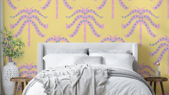 A wall mural of a tropical palm leaf pattern.

