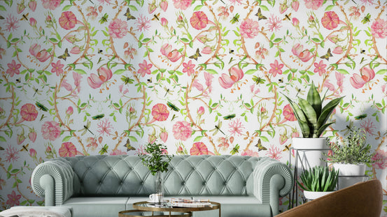 Close-up of soft flowers and birds in a watercolor wallpaper design.

