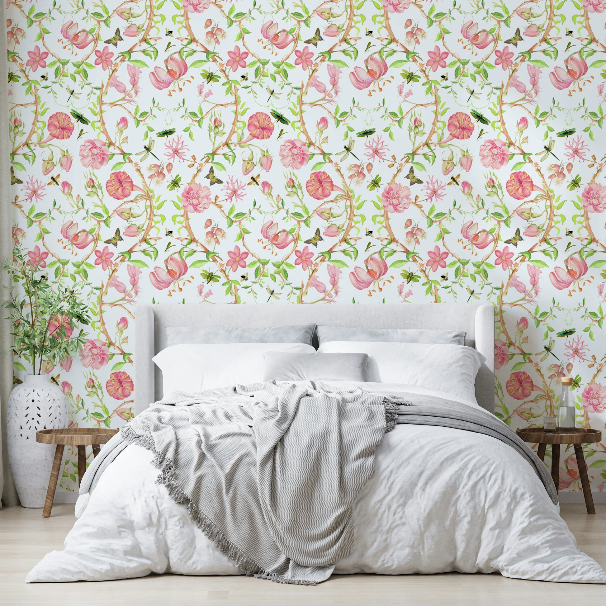 Peach floral wallpaper with green leaves and perched songbirds.


