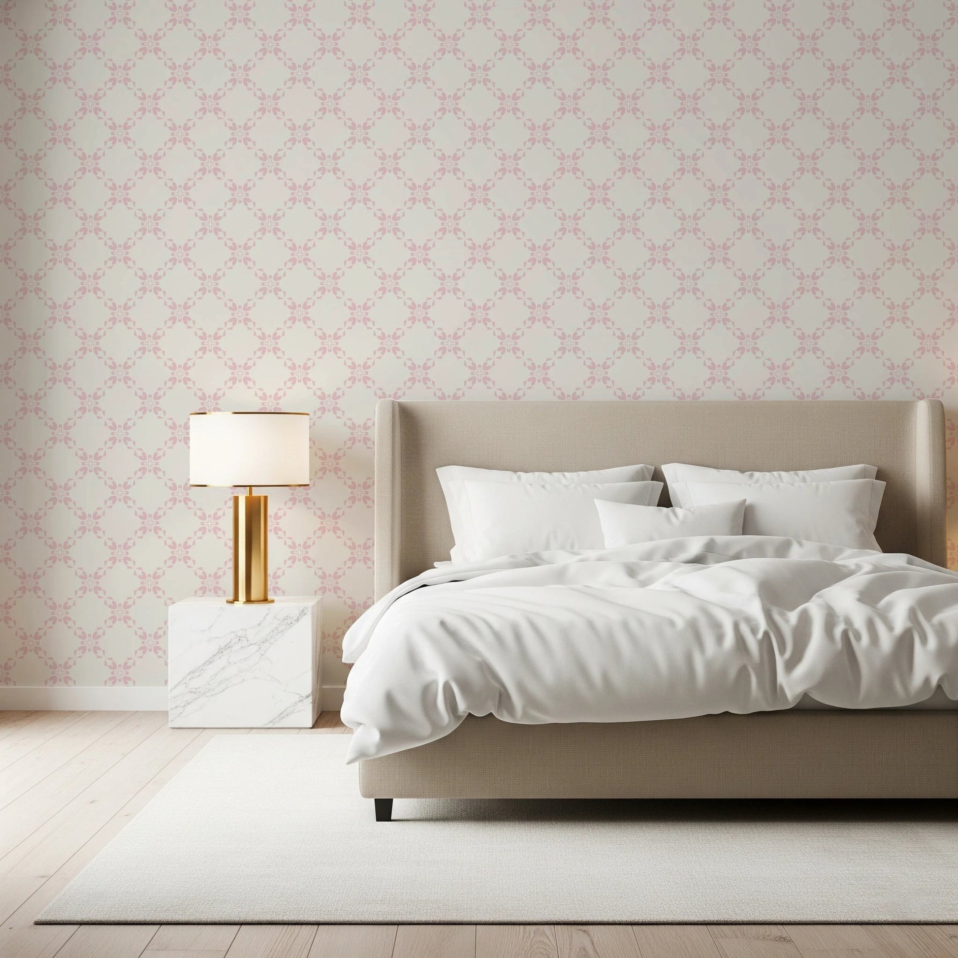 Pink Petal Lattice wallpaper behind a beige upholstered bed with white bedding and a gold table lamp