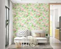 Watercolor floral mural wallpaper in soft pinks

