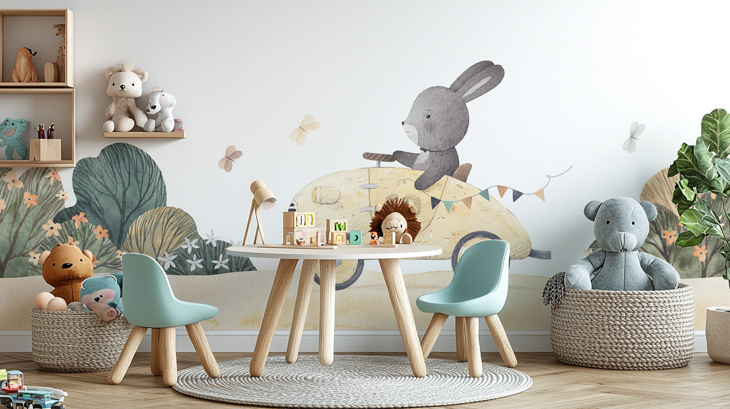 Playful Bunny Car Ride Kids wallpaper mural in a playroom with a round table, teal chairs and stuffed animals