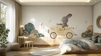Playful Bunny Car Ride Kids wallpaper mural with a grey bunny in a yellow car in a bedroom with a wood desk and bed