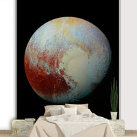 A wall mural featuring a bold, cosmic scene.

