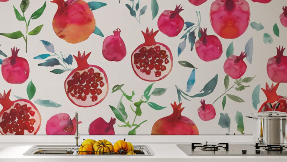 Vibrant pomegranates in soft watercolor strokes
