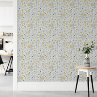 Elegant flat interior featuring Poppies Garden Wallpaper in a guest bedroom.