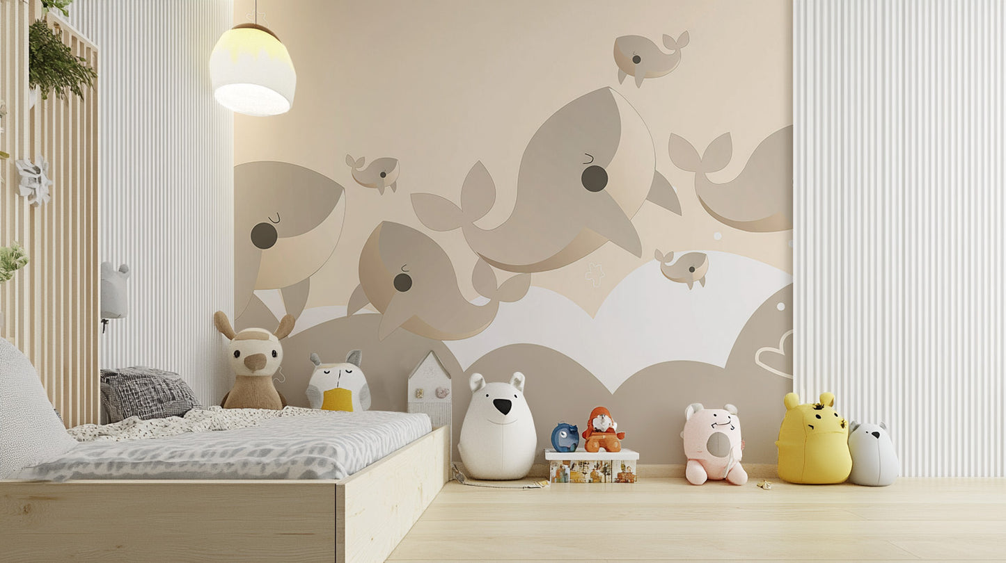Premium Cuddly Cetaceans Wall Mural in a toddler's room with a low floor bed, creating a soft and peaceful environment.