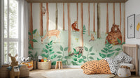 Storybook Wildlife wallpaper mural with deer, fox and bear among trees in a nursery with orange polka-dot bed