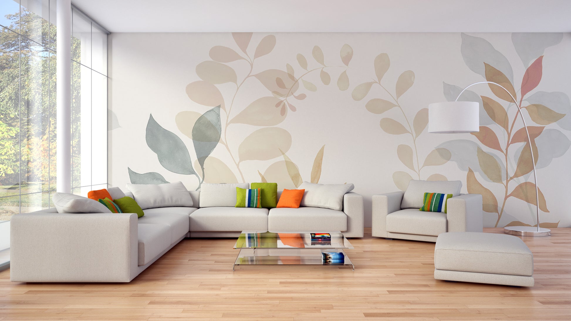 Soft Leaves wallpaper mural in pastel tones behind a beige sectional sofa and arc lamp in a bright living room