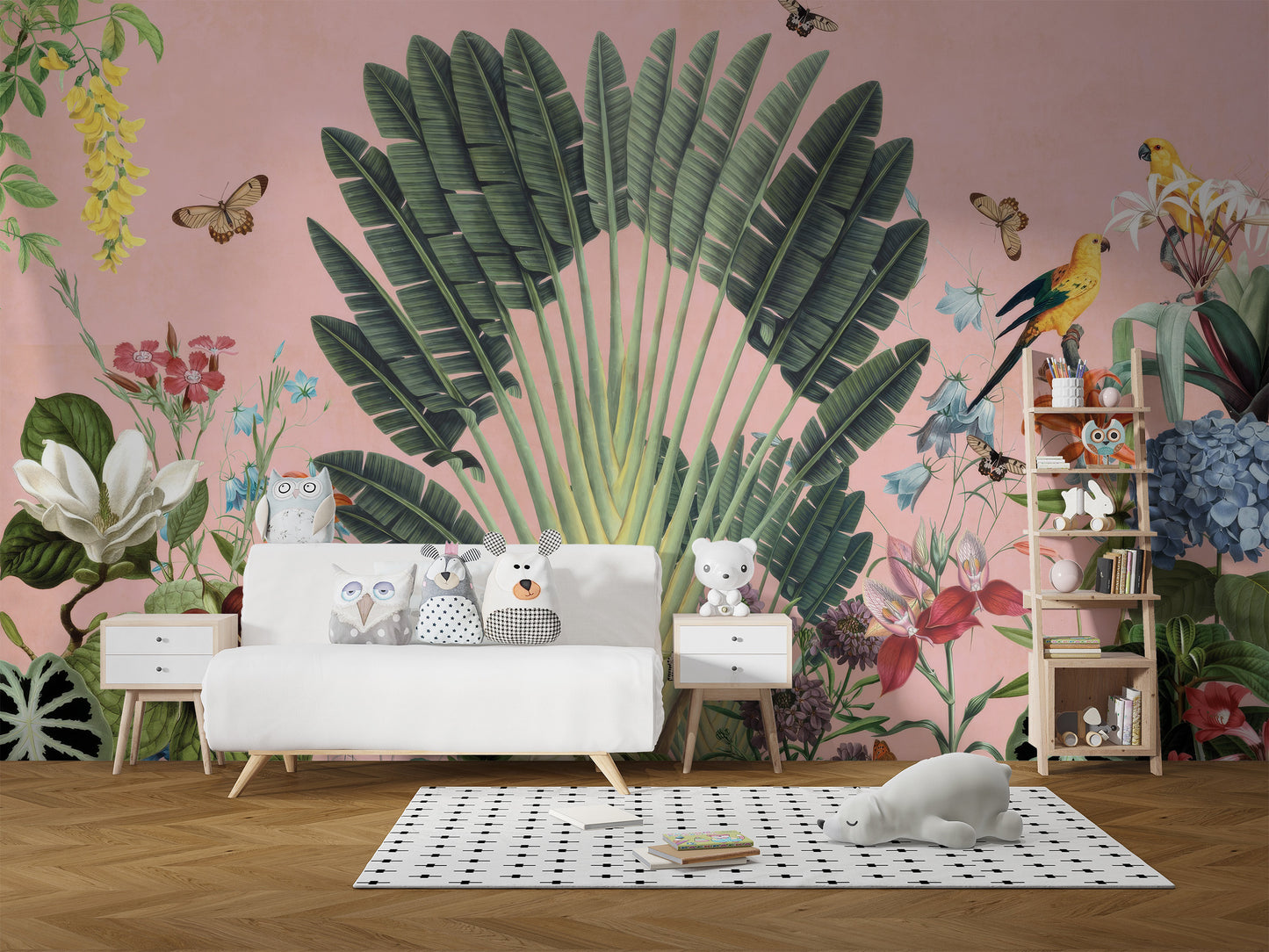 Sunbeam Canopy wallpaper mural of a tropical palm fan and parrots on pink behind a white daybed and owl plush toys in a kids room