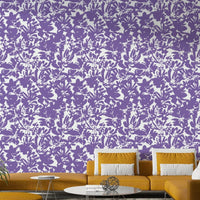 A bedroom decorated with a floral mural

