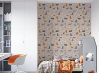 Purrfectly Pawsome Cats wallpaper on beige in a kids bedroom with an orange swivel chair and white wardrobe