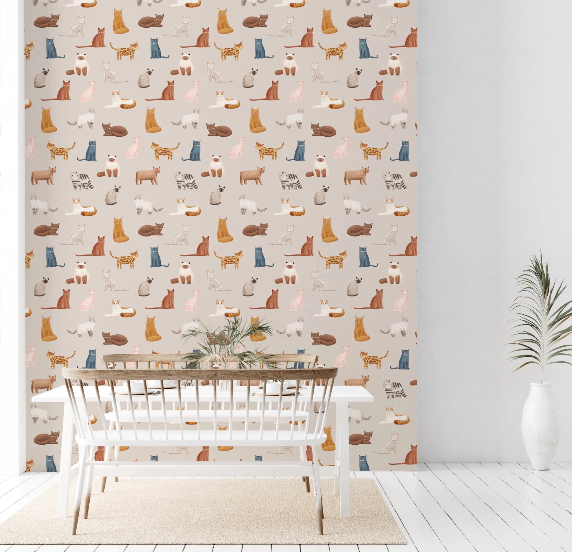 Purrfectly Pawsome Cats wallpaper of illustrated cats on beige in a dining room with a white table and spindle bench
