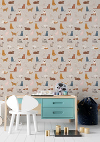 Purrfectly Pawsome Cats wallpaper on beige in a kids room with a teal-drawer desk and white mouse-ear chair