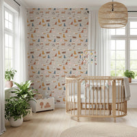 Purrfectly Pawsome Cats wallpaper of beige cat pattern in a nursery with an oval wooden crib and rattan pendant