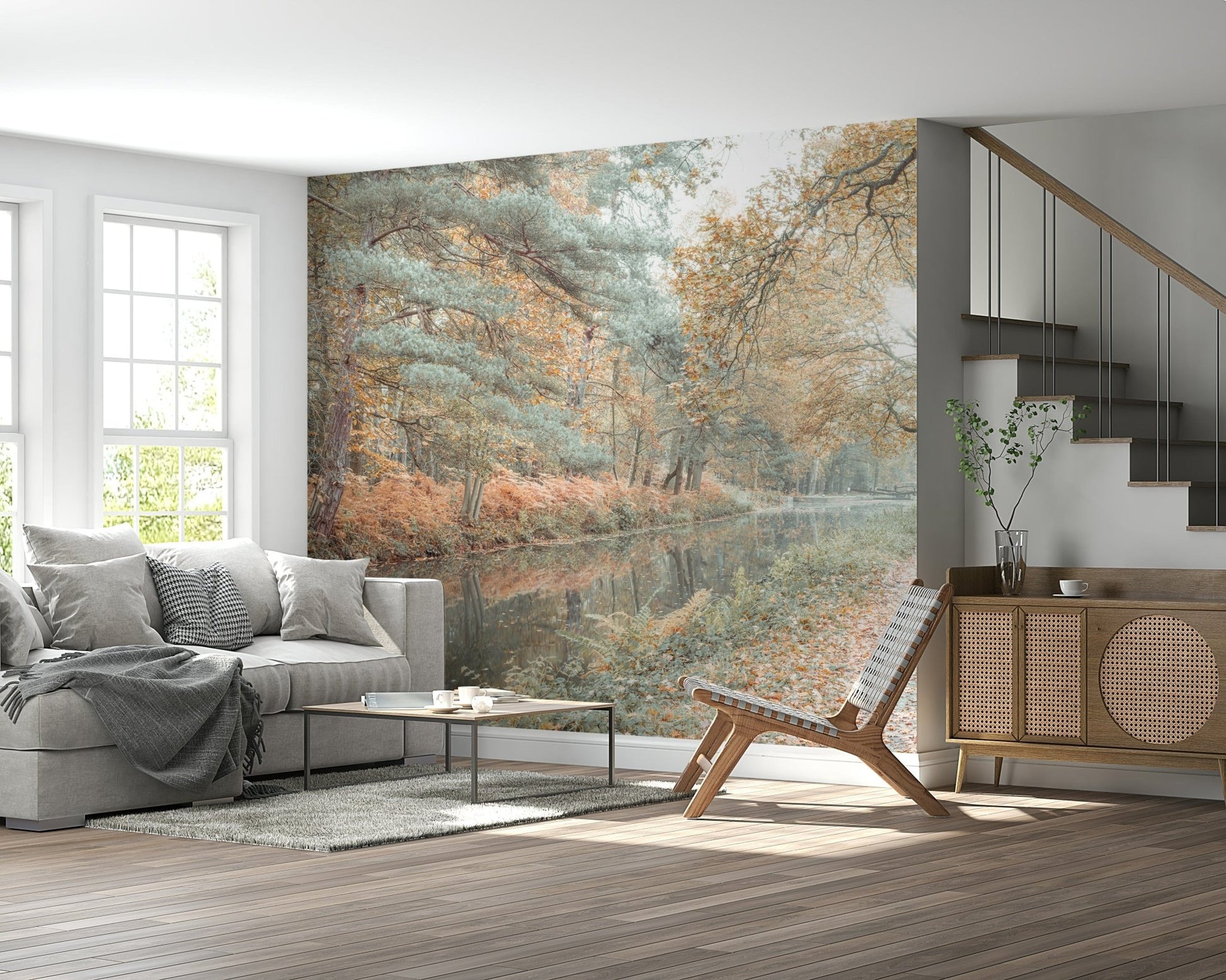 Autumn forest wallpaper with a gentle stream and leaf-covered pathway.
