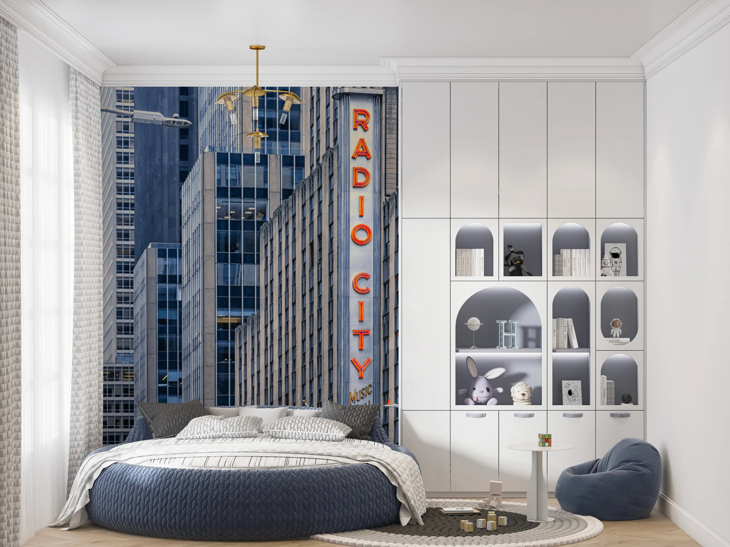Radio City's Glow wallpaper mural with the red neon sign and towers behind a round blue bed and arched shelving in a kids room