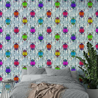 Bright beetles and butterflies on blue wallpaper

