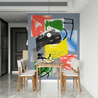 A multicolored wallpaper filled with expressive paint strokes in red, blue, green, yellow, and black.