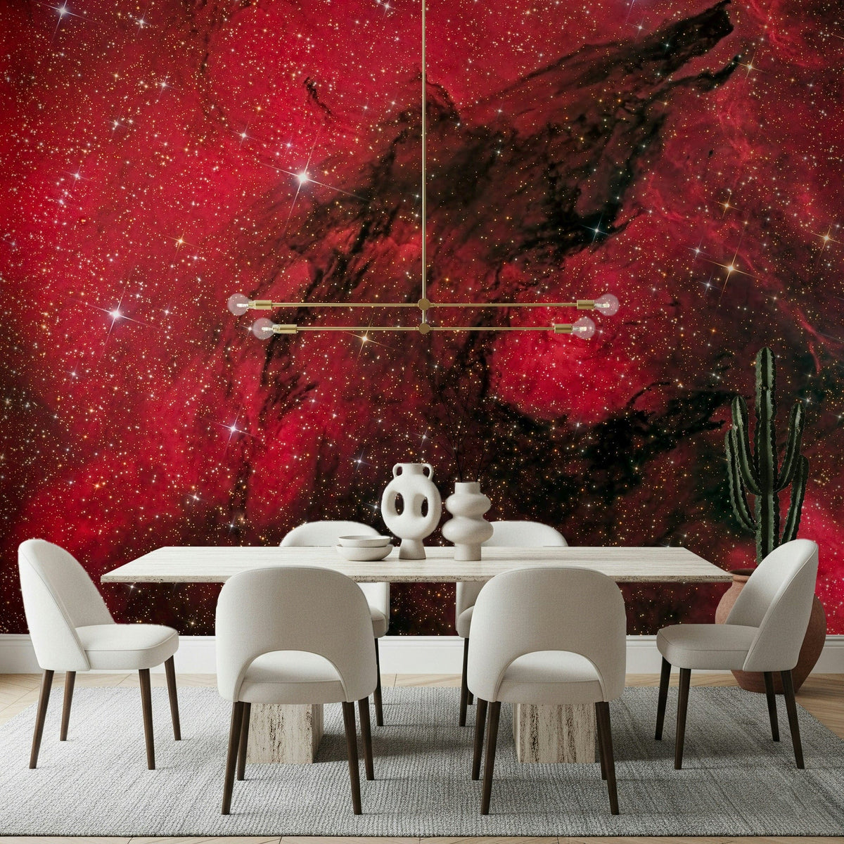 Cosmic Ember wallpaper mural in red starry nebula behind a white dining table and chairs with gold chandelier