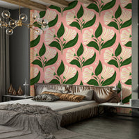 The background is a distinctive avocado pink.
