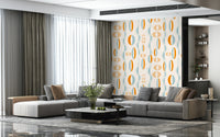 Colorful retro wallpaper with elongated oval shapes and dotted curved lines in a mid-century palette.