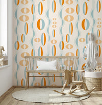 A vintage-style wallpaper showcasing bold oval patterns inspired by classic atomic-era design.
