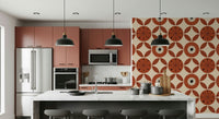 Decorative retro wallpaper with large circular blooms and repeating leaf motifs on a cream background.
