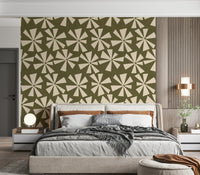 Vintage-style wallpaper showcasing cream star-like floral bursts on a textured olive backdrop.