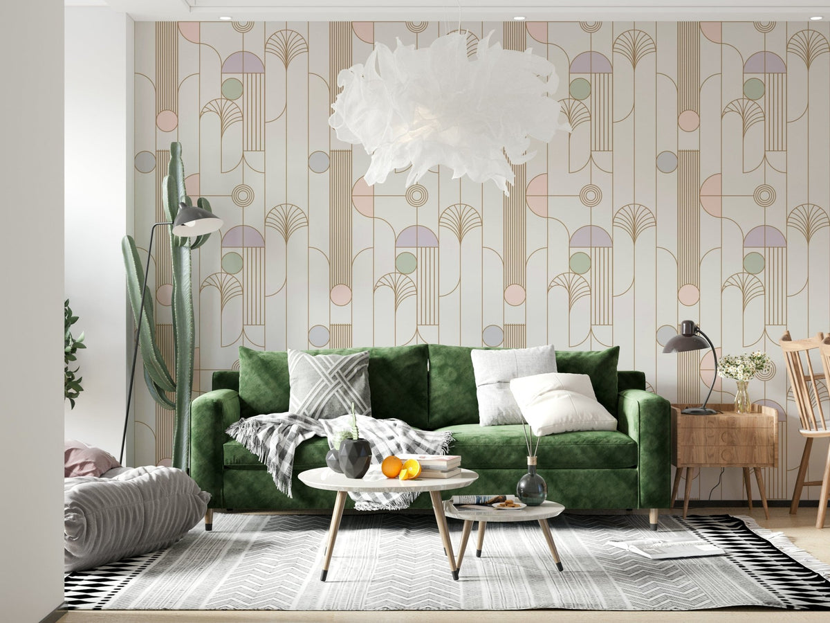 Retro Chic Art Deco wallpaper with pastel deco arches behind a green velvet sofa with tall cactus and feather pendant