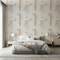 Retro Chic Art Deco wallpaper with gold linework fans behind a grey bed with blush throw and wood nightstands