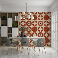 Geometric retro wallpaper with terracotta blooms surrounded by stylized leaf shapes.