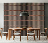 Retro Lines wallpaper in wood-slat brown and black behind a walnut dining table under a black pendant