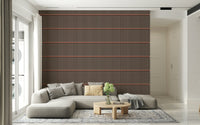 Retro Lines wallpaper in brown and black behind a floating nightstand and bed in a modern bedroom