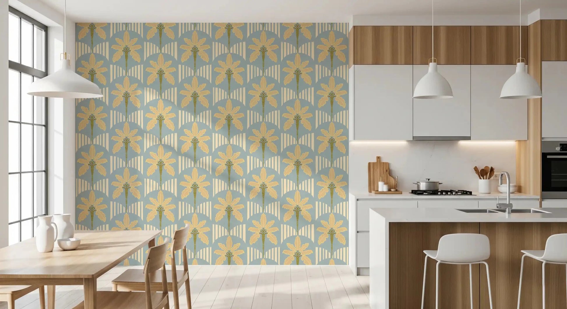 Kitchen and dining room with blue palm wallpaper and stripe arches in warm gold tones