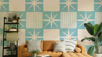 Retro starburst quilt block wallpaper in blue

