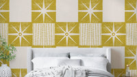 Retro starburst quilt block wallpaper in mustard yellow

