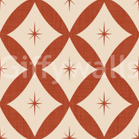 Mid-century geometric wallpaper with tiled diamond forms and starburst centers.